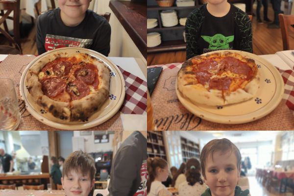 Chłopcy z własnoręcznie przygotowaną pizzą